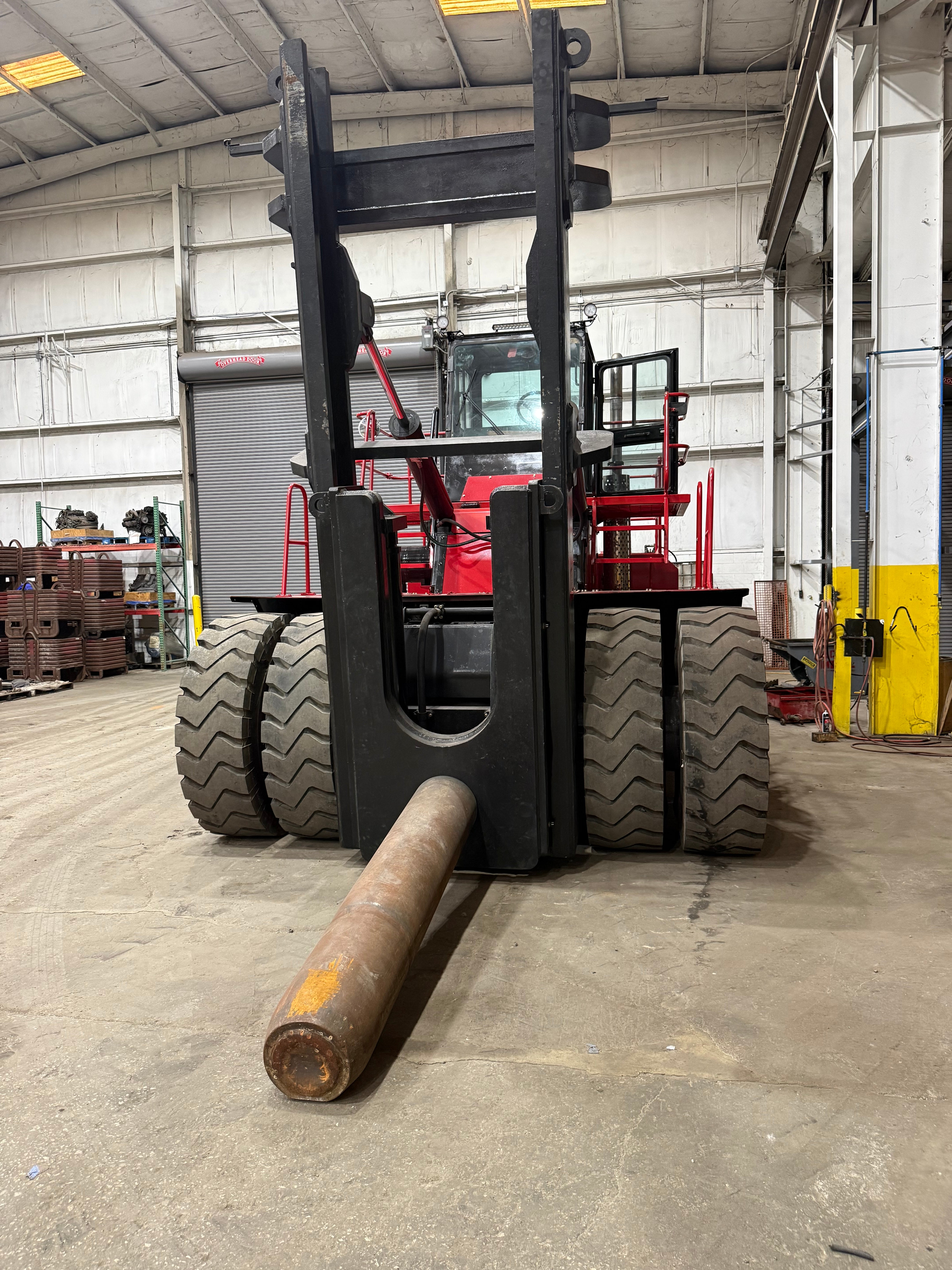 Taylor TE900SX Coil Hauler Forklift (Fully Rebuilt) Equipped with Steel Coil Ram
